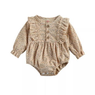 Long sleeve romper in beige with flower prints and rows of ruffles on the front
