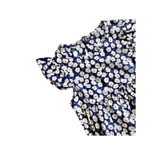 closeup of our toddler romper with soft floral print